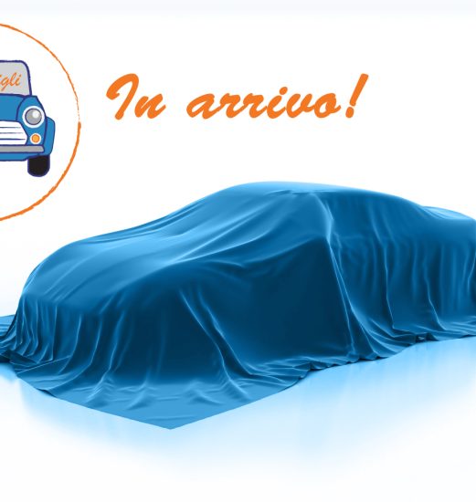 Blue car under a satin cover on a white studio background, with orange 'In arrivo!' text and a circular logo featuring a blue car labeled 'AutoNawili'.
